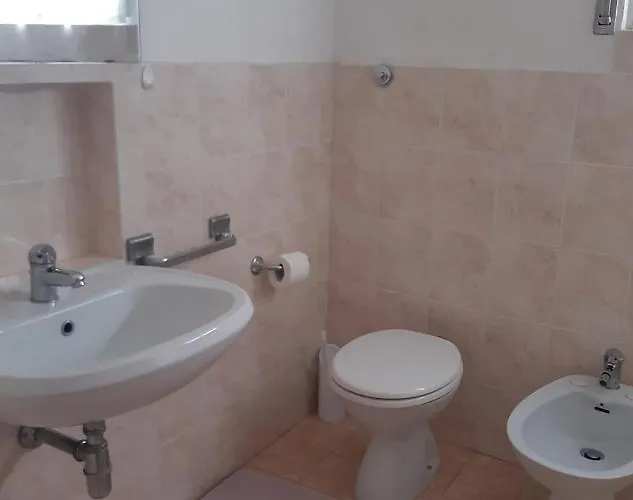 Отель Punta Nera Порто Санто Стефано